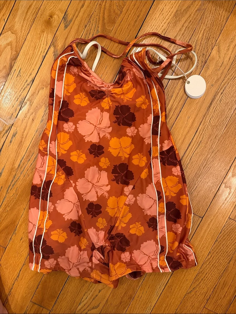 Strait. The Label. One piece hibiscus romper